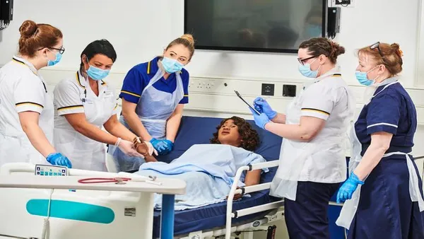 Nursing students in hospital lab