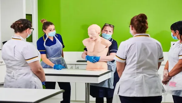 Nursing students in hospital lab