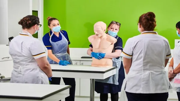 Nursing students in hospital lab