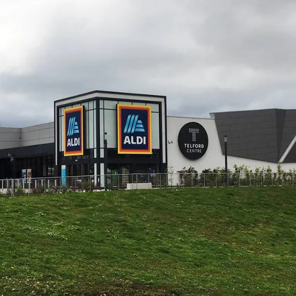Telford Centre Aldi, the logos for Aldi and Telford Centre next to each other