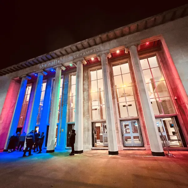 The Halls building illuminated at night